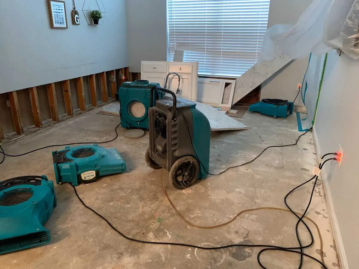Dehumidifier in flood-cut room for Water Damage Restoration in Tecumseh
